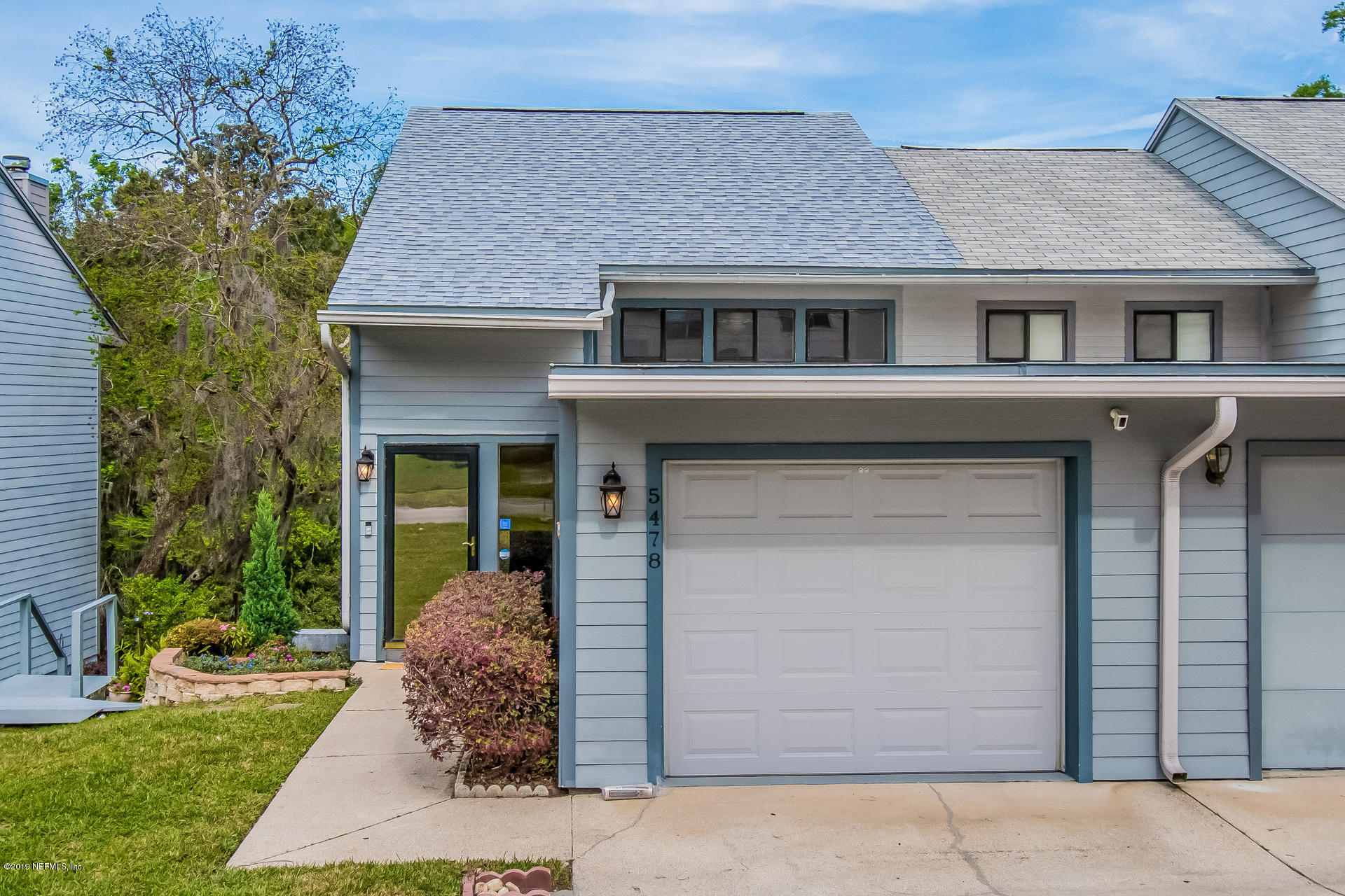 5478 Stanford Road Jacksonville, FL 32207 - Photo 26 of 26 a front view of a house with garden
