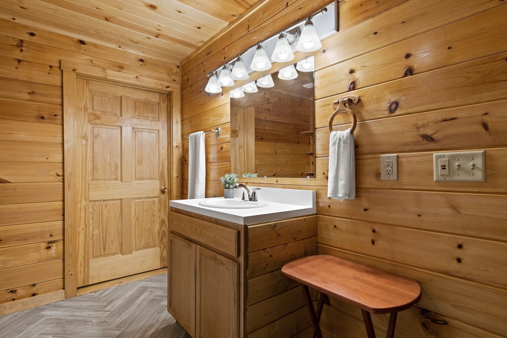 96 Holiday Court Ellijay, GA 30540 - Photo 25 of 51 a bathroom with a sink toilet and shower