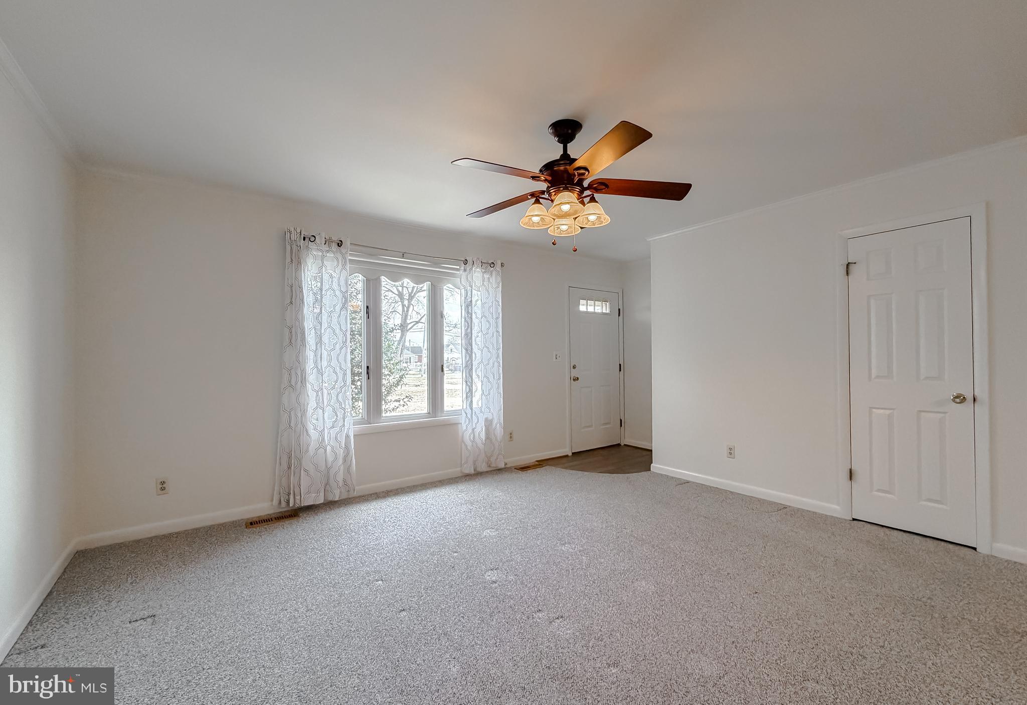 7615 Mill Creek Road Benedict, MD 20612 - Photo 8 of 37 a view of an empty room with a window