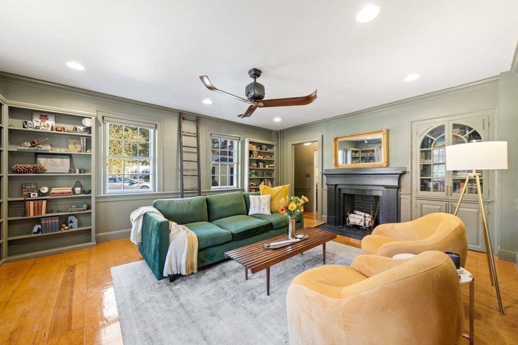 46 Church Street Dedham, MA 02026 - Photo 11 of 42 a living room with furniture and a fireplace