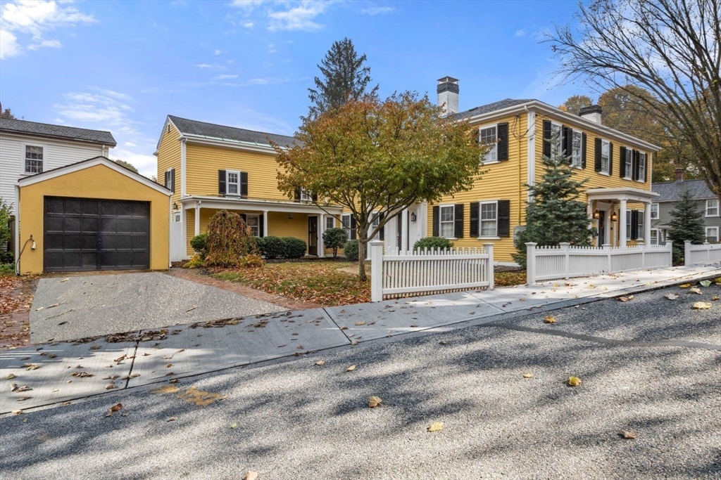 46 Church Street Dedham, MA 02026 - Photo 2 of 42 a front view of a house with a yard