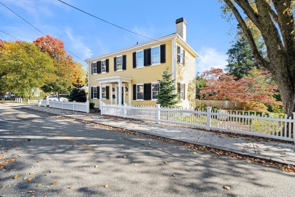 46 Church Street Dedham, MA 02026 - Photo 36 of 42 a front view of a house with a yard