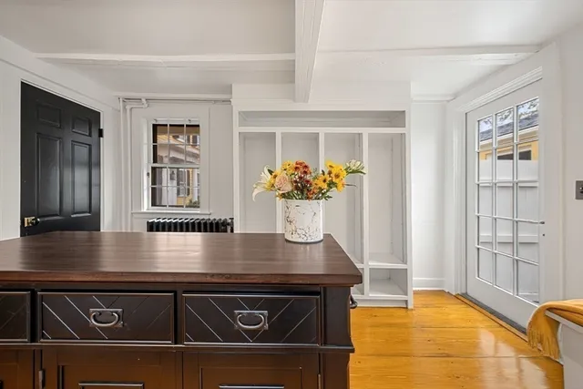 a large kitchen with lots of counter top space and stainless steel appliances