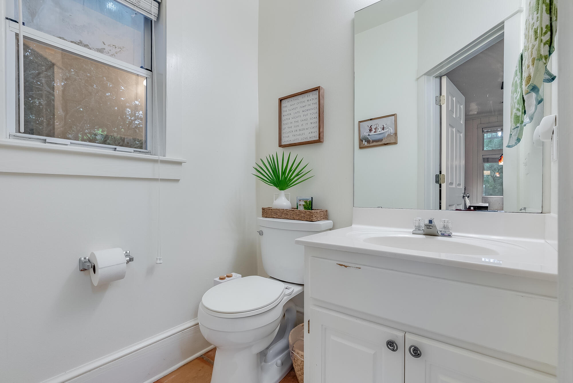 180 Wilderness Way Santa Rosa Beach, FL 32459 - Photo 11 of 69 a bathroom with a sink a toilet and mirror