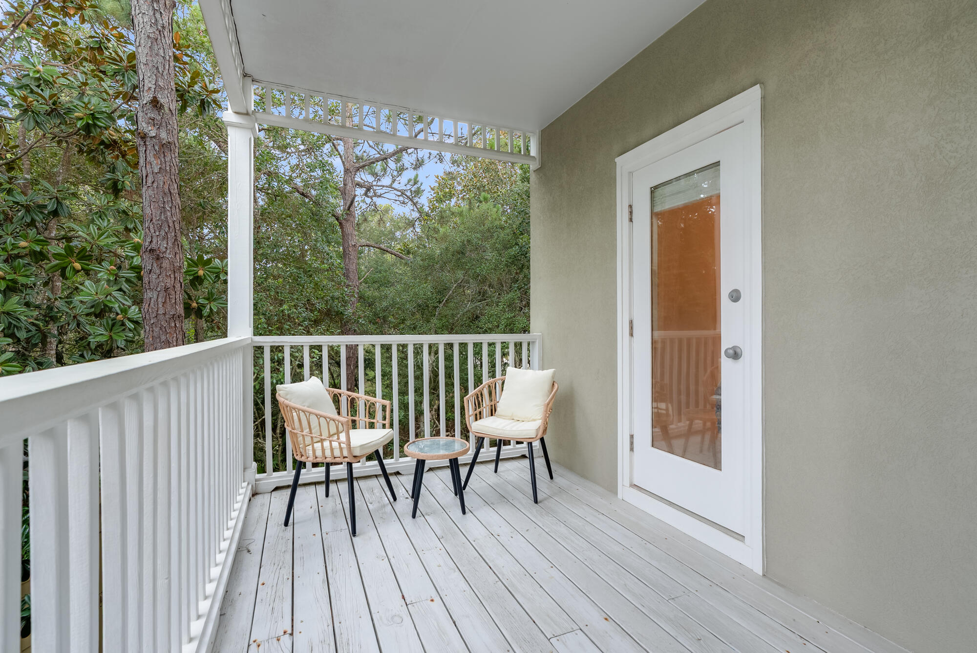 180 Wilderness Way Santa Rosa Beach, FL 32459 - Photo 20 of 69 a view of a wooden chairs and bench in balcony