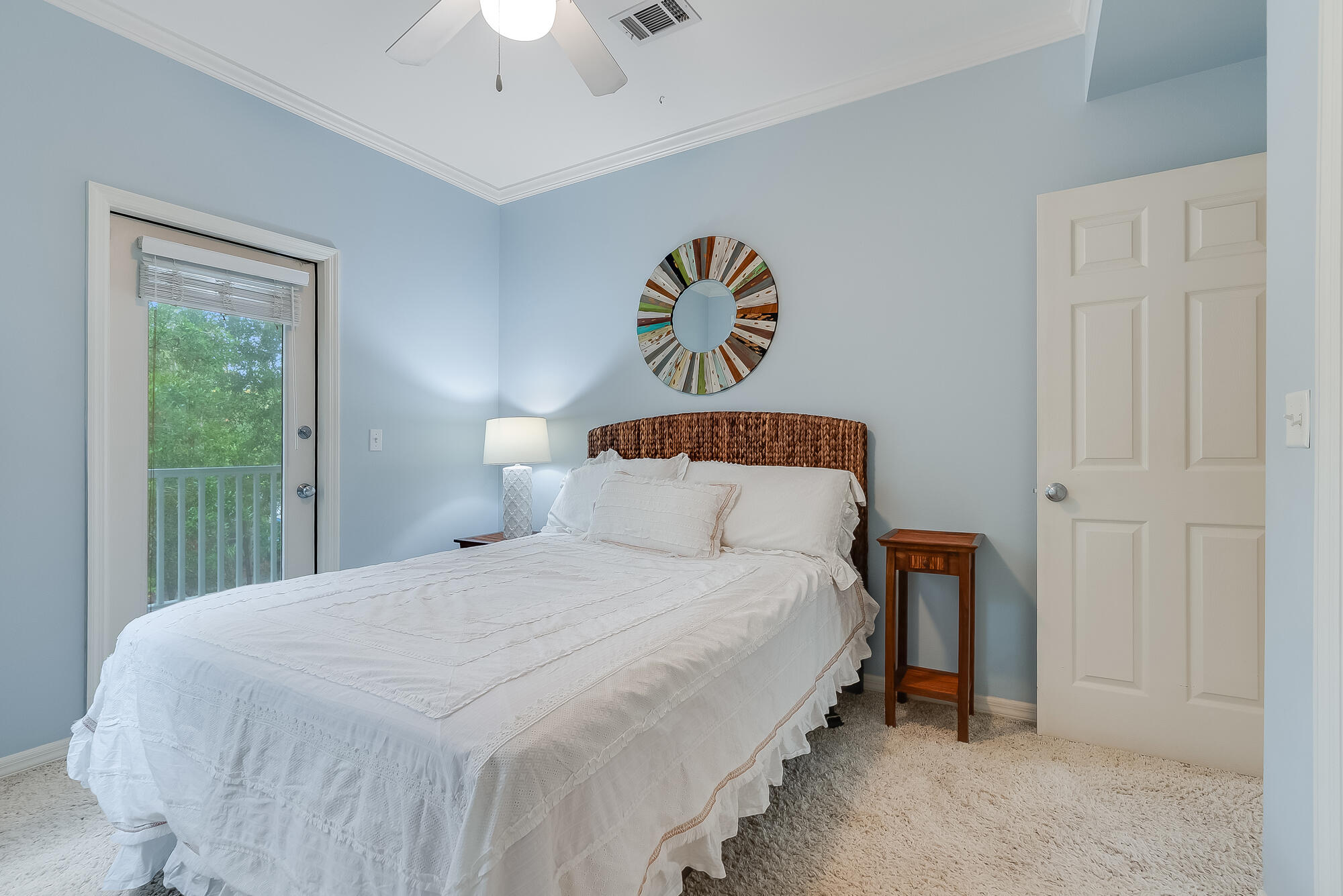 180 Wilderness Way Santa Rosa Beach, FL 32459 - Photo 22 of 69 a bedroom with a bed and a chandelier