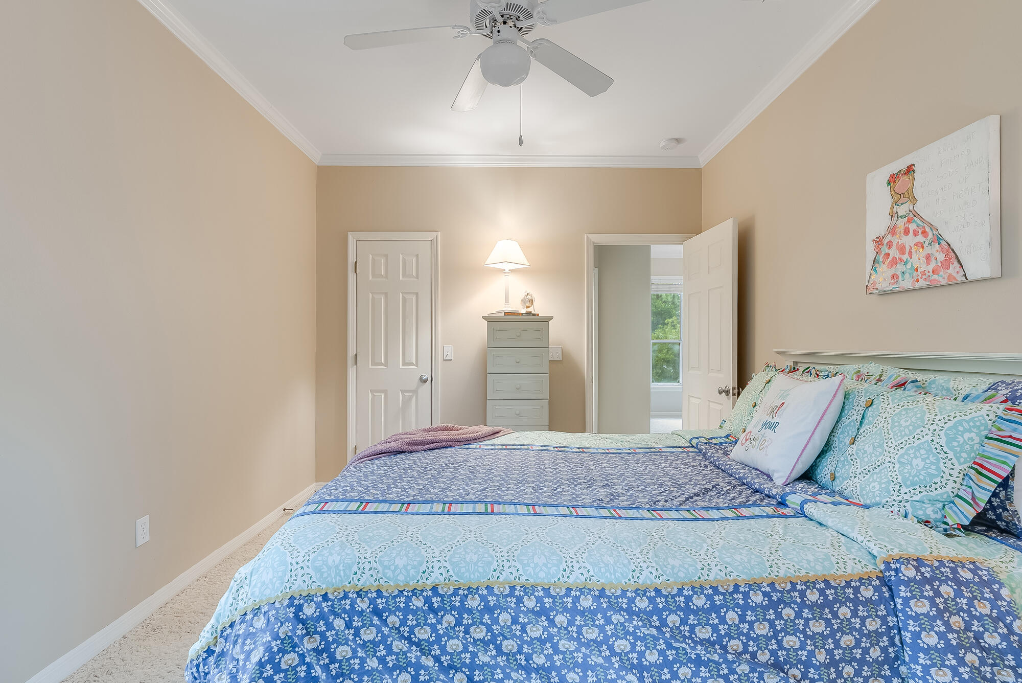 180 Wilderness Way Santa Rosa Beach, FL 32459 - Photo 25 of 69 a bedroom with a bed and a chandelier