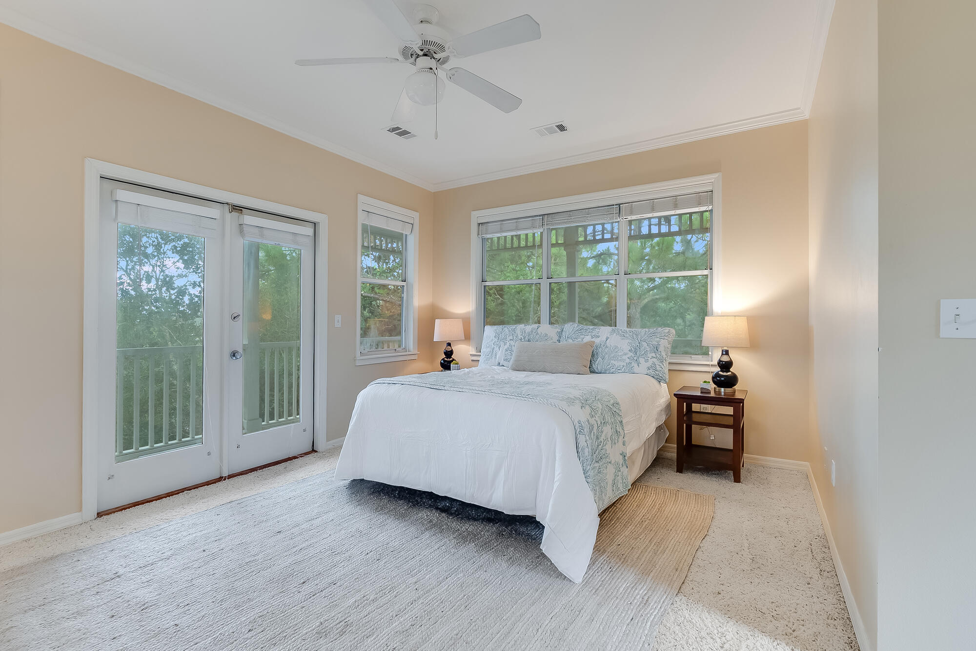 180 Wilderness Way Santa Rosa Beach, FL 32459 - Photo 28 of 69 a bedroom with a large bed and a window