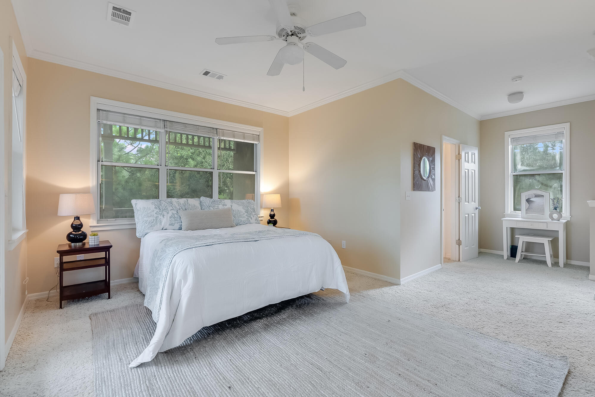 180 Wilderness Way Santa Rosa Beach, FL 32459 - Photo 29 of 69 a bedroom with a bed and a chair