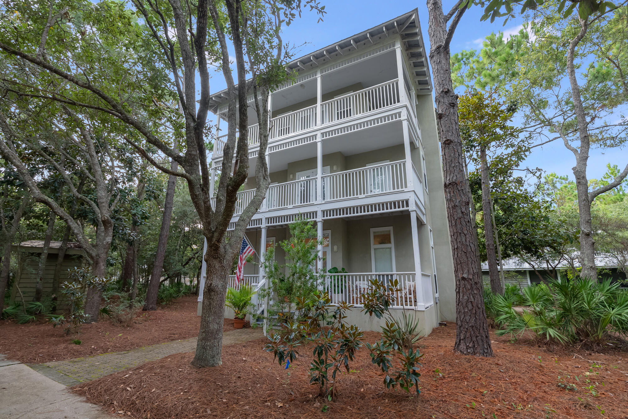 180 Wilderness Way Santa Rosa Beach, FL 32459 - Photo 4 of 69 a front view of a house with a yard
