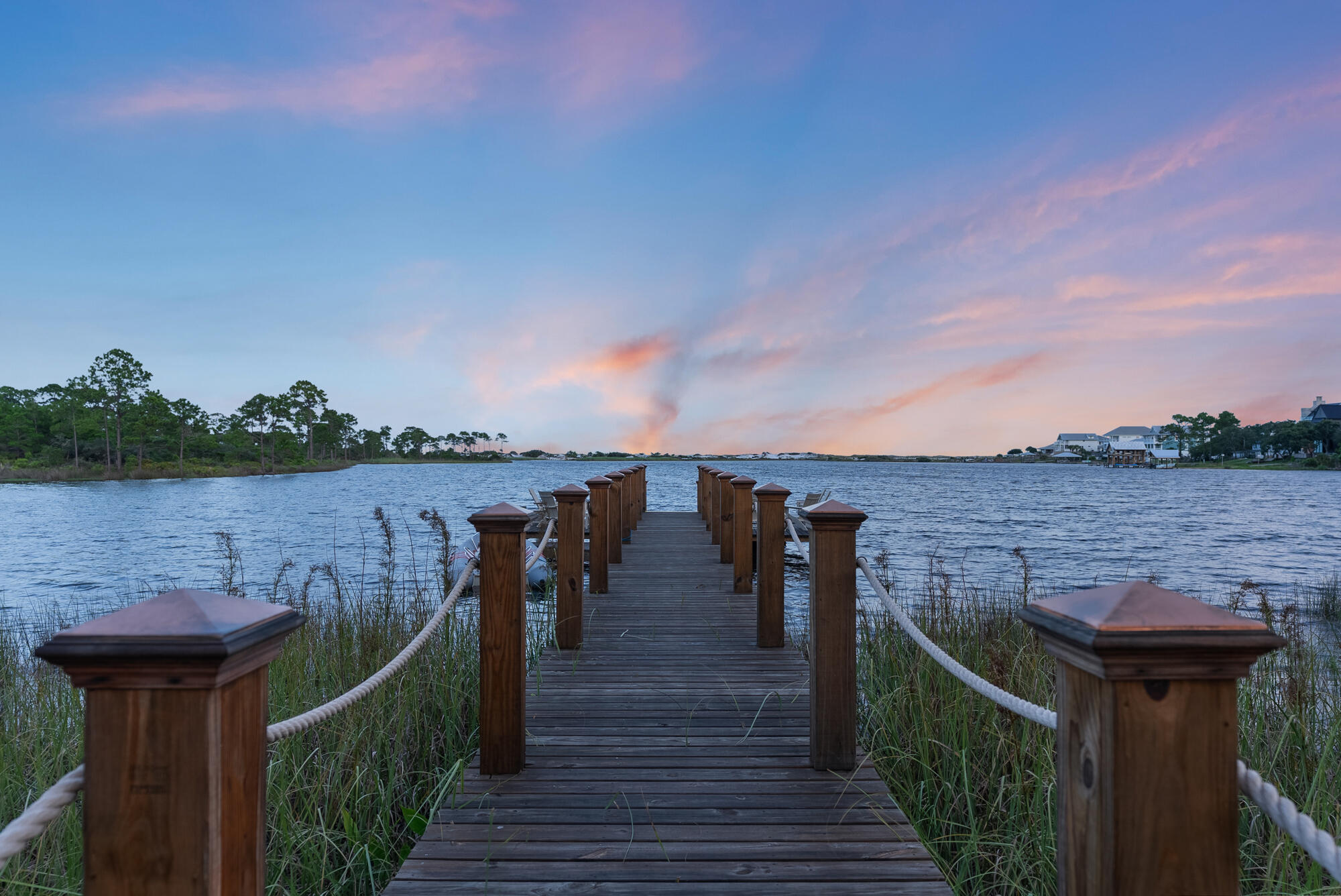 180 Wilderness Way Santa Rosa Beach, FL 32459 - Photo 58 of 69 a view of a lake with a terrace