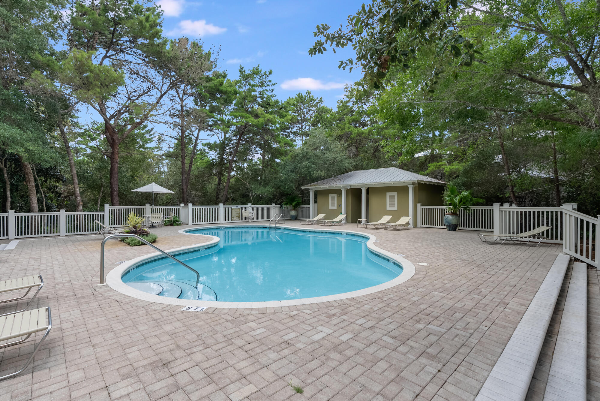 180 Wilderness Way Santa Rosa Beach, FL 32459 - Photo 61 of 69 a view of a house with a swimming pool and sitting area
