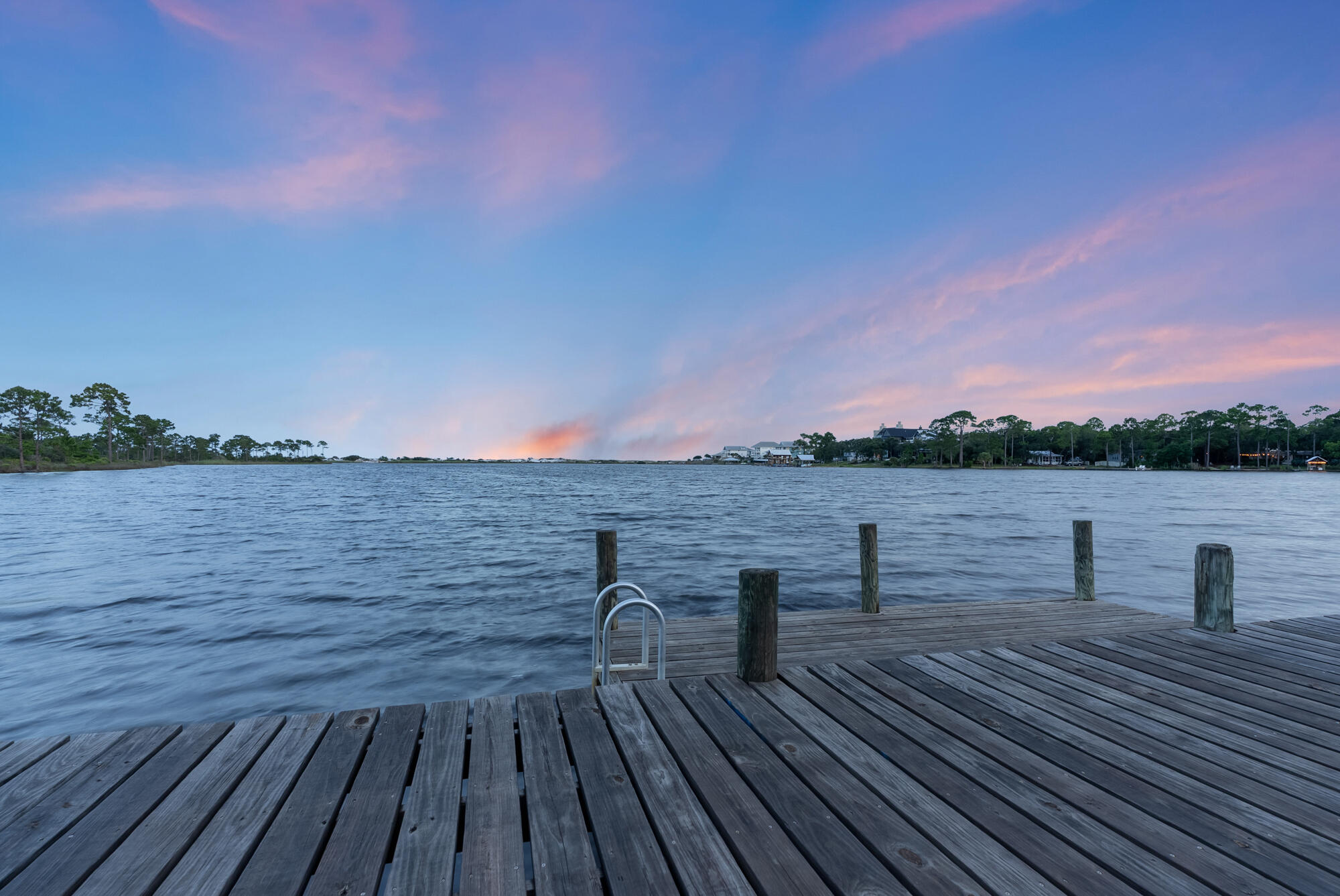 180 Wilderness Way Santa Rosa Beach, FL 32459 - Photo 69 of 69 a view of a terrace with wooden floor and lake view