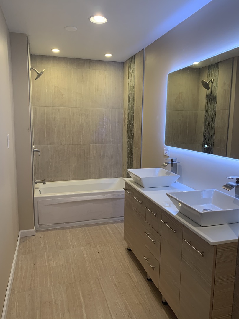 38 Wedgewood Road Matteson, IL 60443 - Photo 11 of 14 a bathroom with a granite countertop sink and a mirror