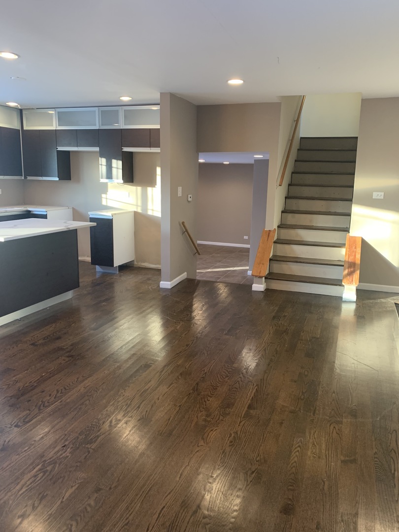 38 Wedgewood Road Matteson, IL 60443 - Photo 3 of 14 a view of a kitchen with a sink and dishwasher with wooden floor
