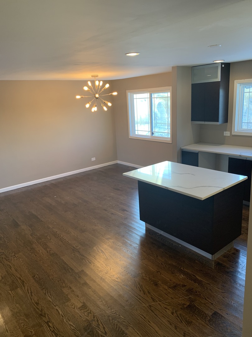 38 Wedgewood Road Matteson, IL 60443 - Photo 5 of 14 a swimming pool with wooden floor
