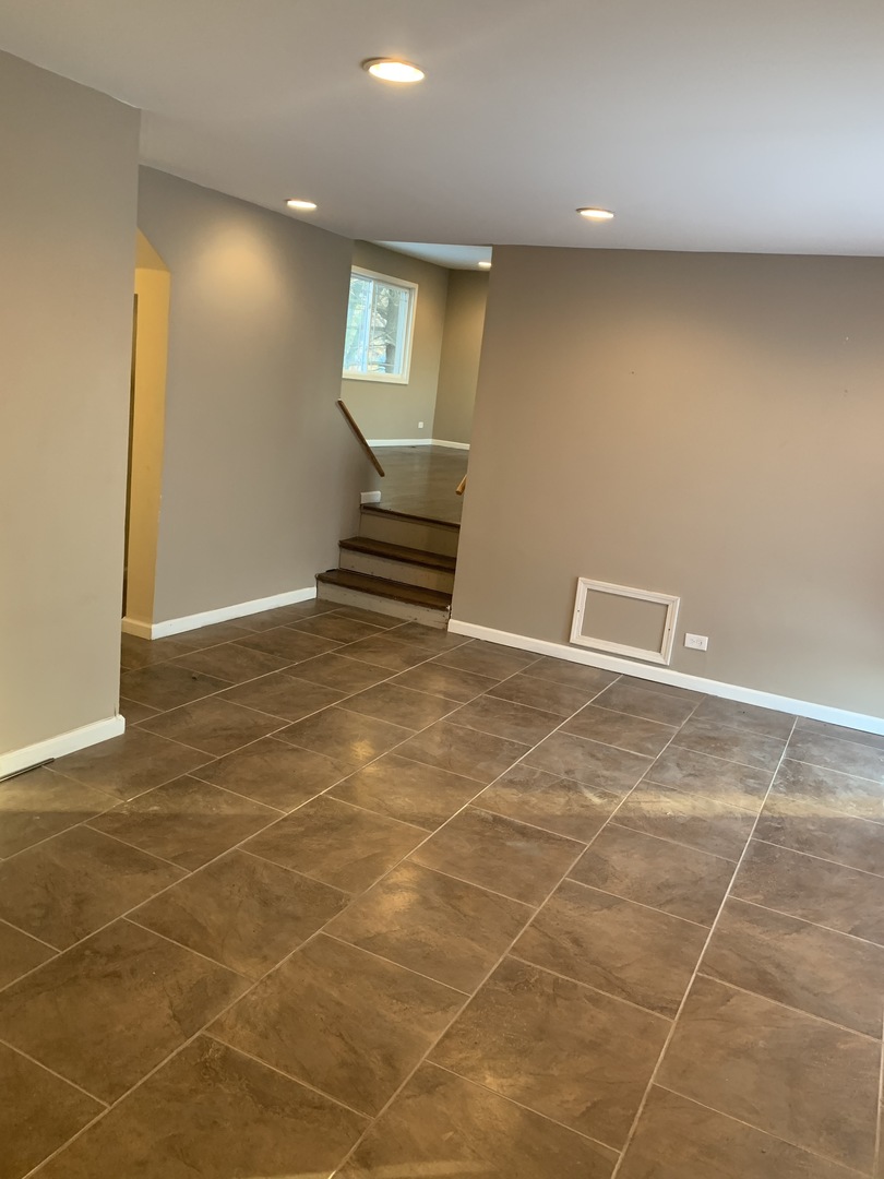 38 Wedgewood Road Matteson, IL 60443 - Photo 8 of 14 a view of an empty room with a window