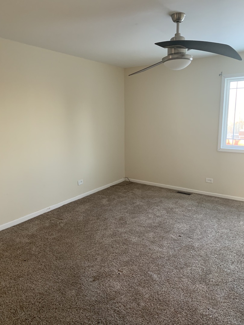 38 Wedgewood Road Matteson, IL 60443 - Photo 10 of 14 an empty room with a window