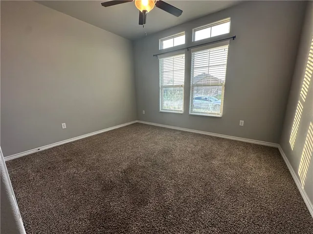 an empty room with a empty space and a window