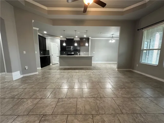 a view of hallway with windows