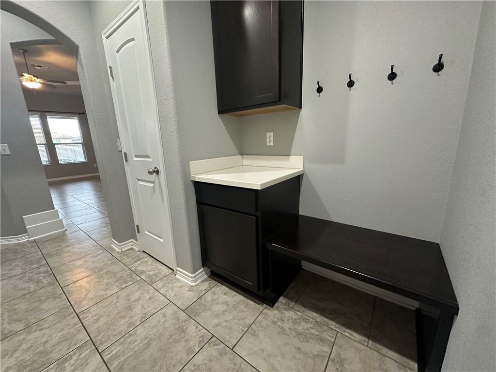 1015 Santa Catalina Street Portland, TX 78374 - Photo 30 of 34 a bathroom with a sink and a mirror