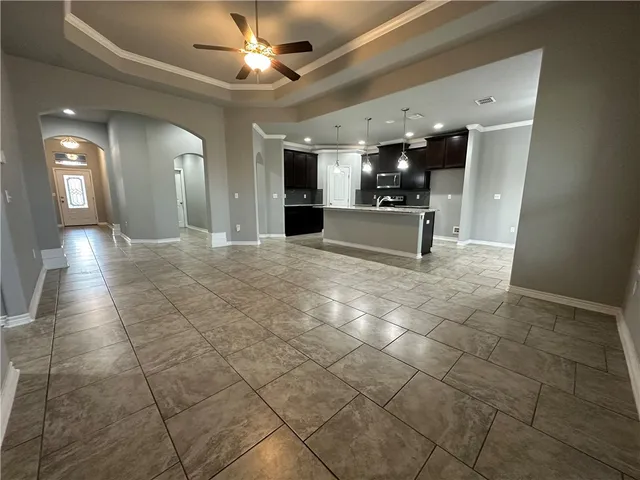 a view of a hallway with seating space