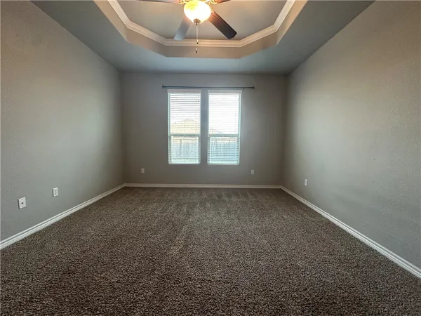 an empty room with a empty space and a window