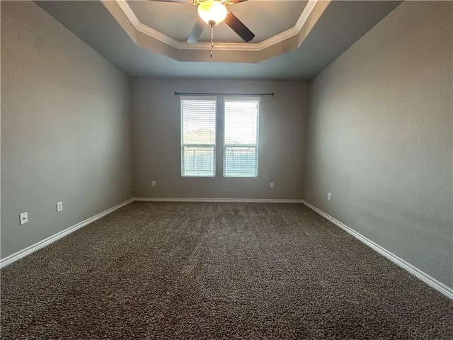 an empty room with a empty space and a window