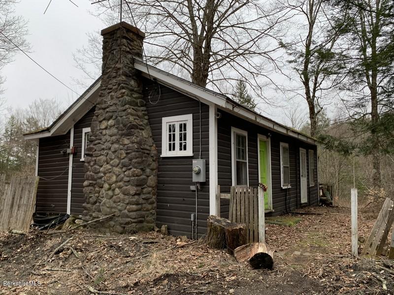 164 Heath Road Colrain, MA 01340 - Photo 1 of 18 a front view of a house with garden