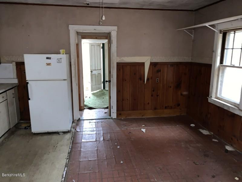 164 Heath Road Colrain, MA 01340 - Photo 11 of 18 a view of empty room with windows