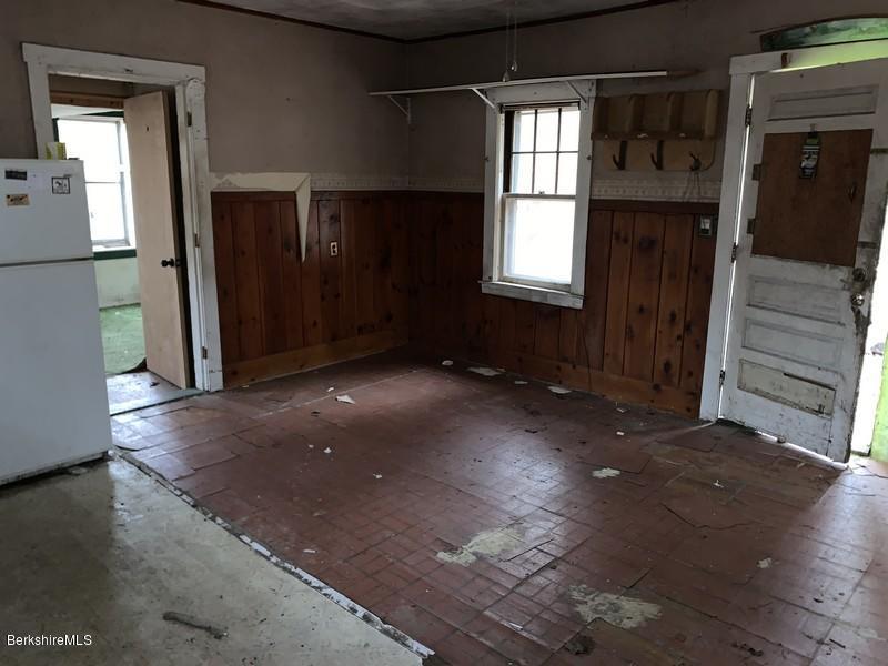 164 Heath Road Colrain, MA 01340 - Photo 12 of 18 a view of an empty room with a window
