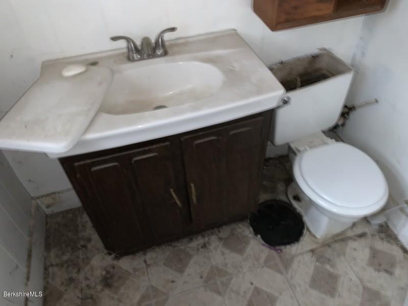 164 Heath Road Colrain, MA 01340 - Photo 15 of 18 a bathroom with a sink and a toilet
