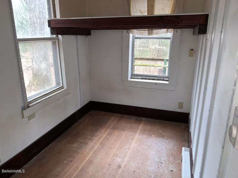 164 Heath Road Colrain, MA 01340 - Photo 16 of 18 a view of an empty room with a window