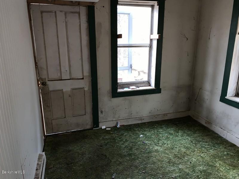 164 Heath Road Colrain, MA 01340 - Photo 18 of 18 a view of an empty room with a window