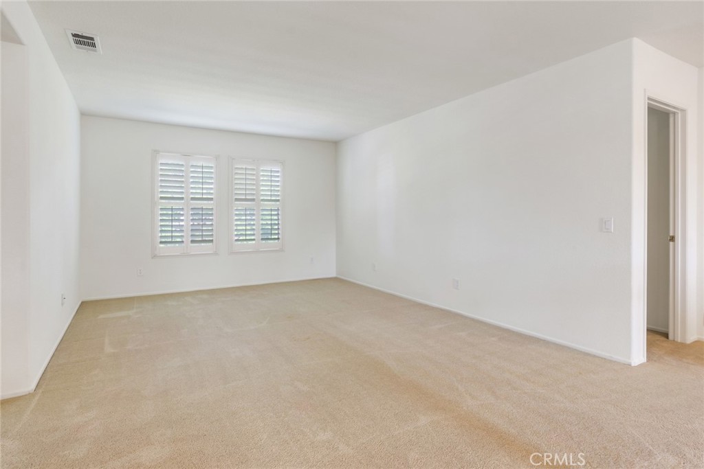 9140 Village Way Riverside, CA 92508 - Photo 31 of 37 an empty room with windows