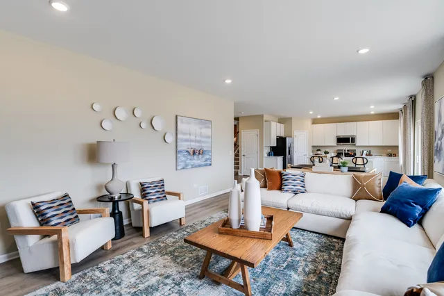 a living room with furniture and a table