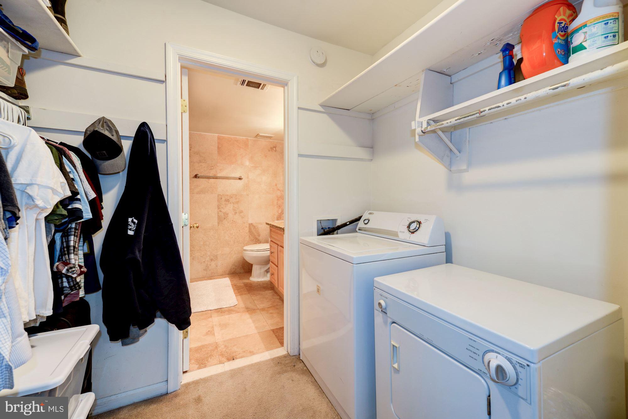 5901 Kingsford Road, Unit 438 Springfield, VA 22152 - Photo 14 of 29 Master Bedroom Closet and Laundry