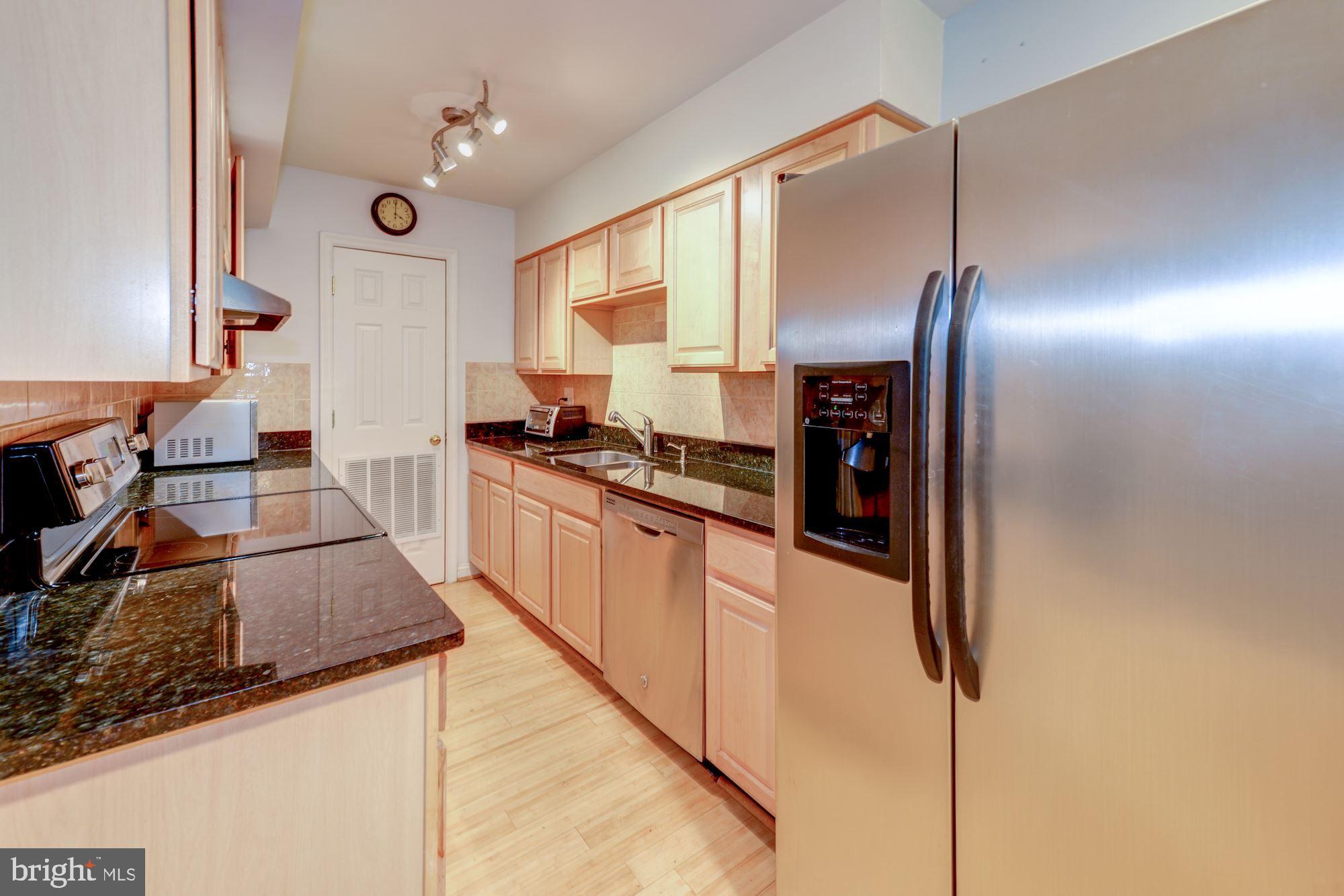 5901 Kingsford Road, Unit 438 Springfield, VA 22152 - Photo 5 of 29 Renovated Kitchen with new Dishwasher and Stove