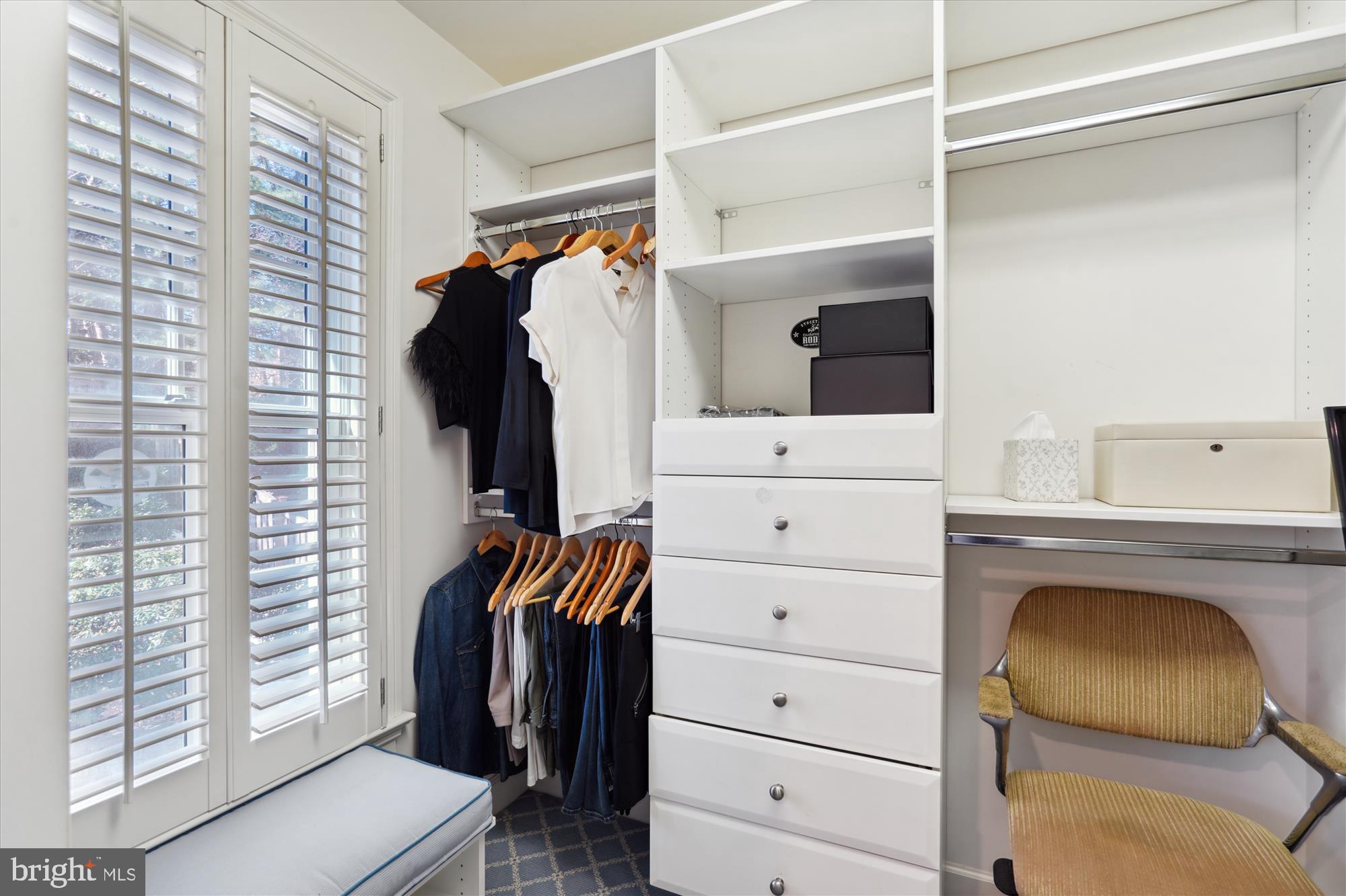 5008 Baltan Road Bethesda, MD 20816 - Photo 43 of 76 a view of walk in closet with clothes and shoes