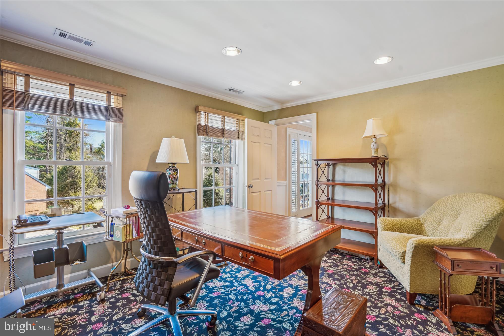 5008 Baltan Road Bethesda, MD 20816 - Photo 48 of 76 a view of a workspace with furniture and a window