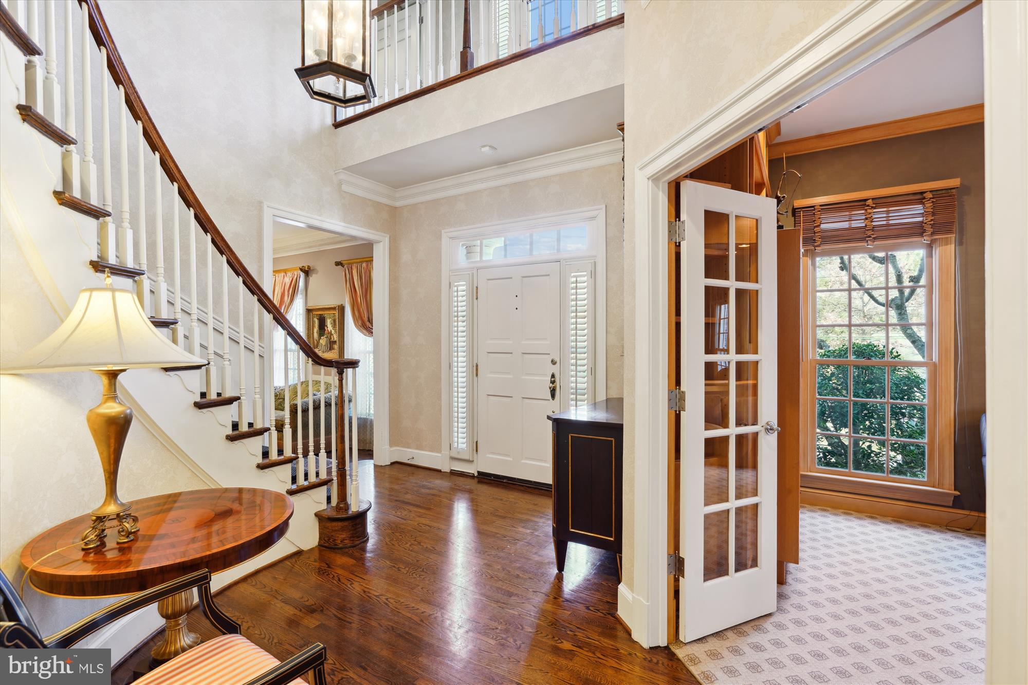 5008 Baltan Road Bethesda, MD 20816 - Photo 8 of 76 a view of entryway with wooden floor and front door