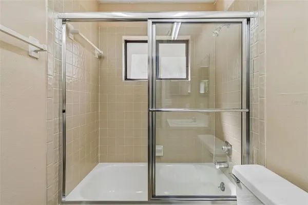 a view of a park with swings and slides