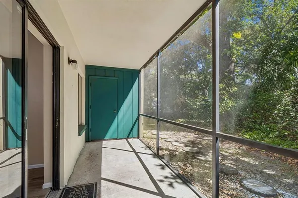 a view of a city with flower plants in front of it