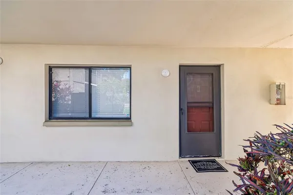 a kitchen with a stove and a microwave