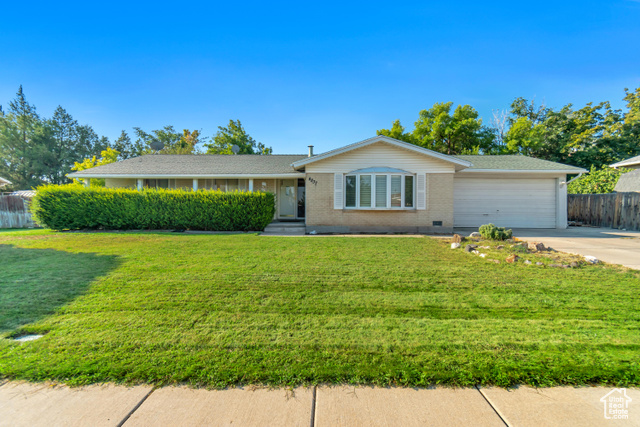 4837 Panamint Road West Valley City, UT 84120 - Photo 1 of 1 Single story home with a front yard and a garage