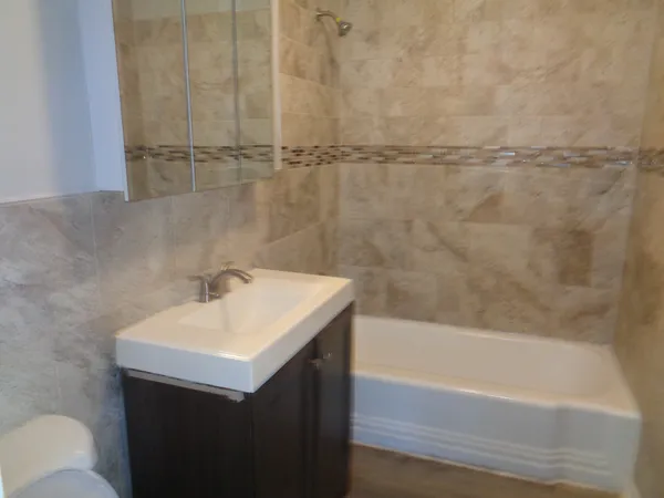 a bathroom with a sink and a bathtub