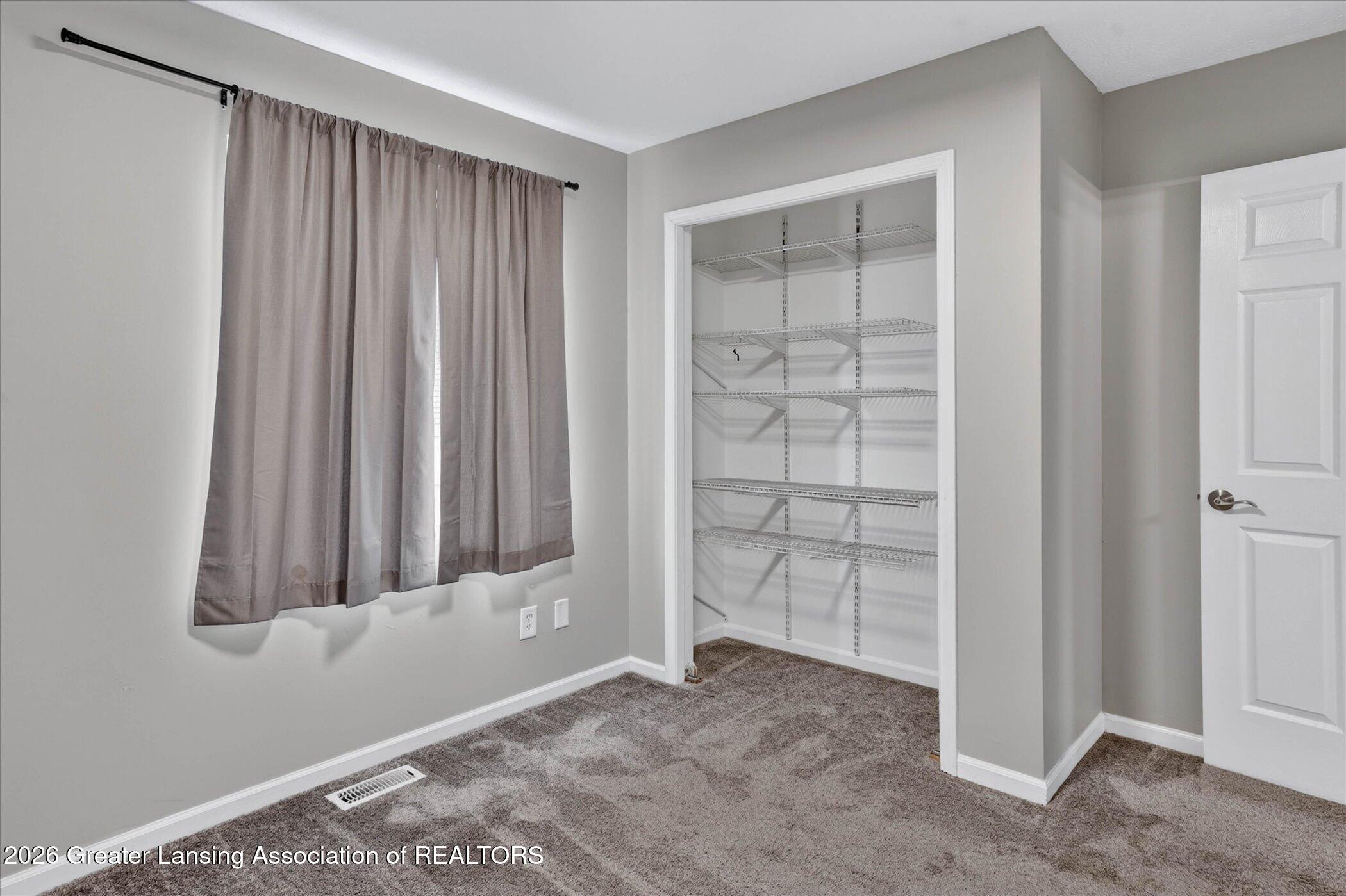 5105 Hughes Road Lansing, MI 48911 - Photo 13 of 26 19-5105-Hughes-Rd-WindowStill-Photograph