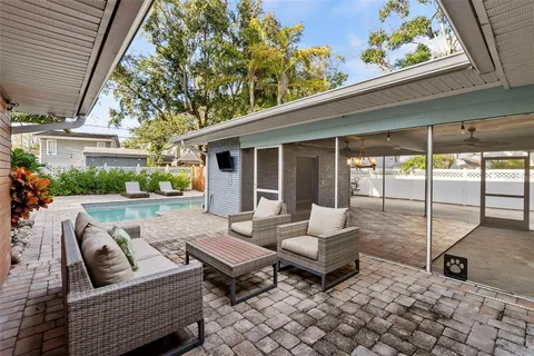 a view of a backyard of the house