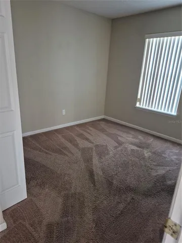 a view of a room with an empty space