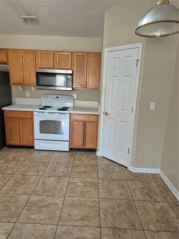 a utility room with washer and dryer